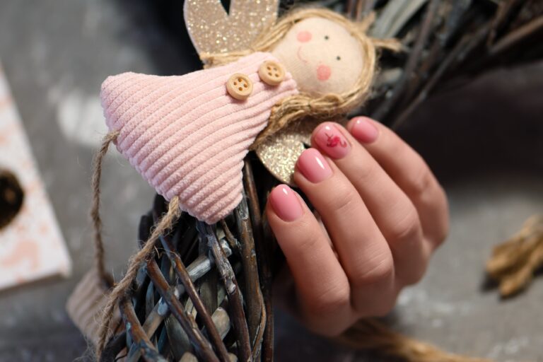 pink nail design female hand with pink manicure min